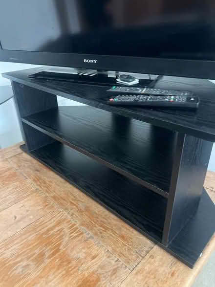 Photo of free Black wood tv stand (Biggin hill TN16) #1
