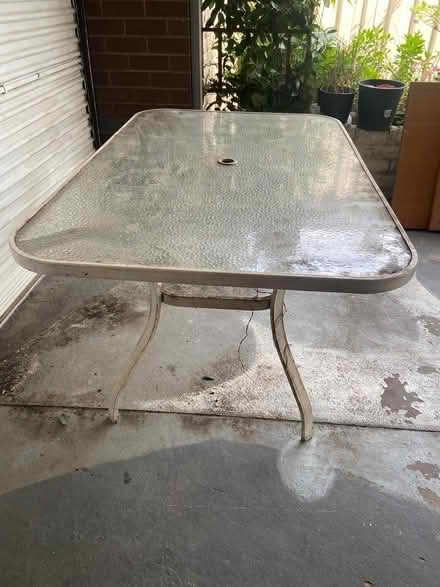 Photo of free iron garden table with a glass top (Keysborough-3173) #1