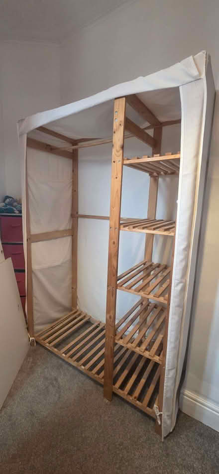 Photo of free Wooden slatted wardrobe with cover (Nether Edge S7) #1