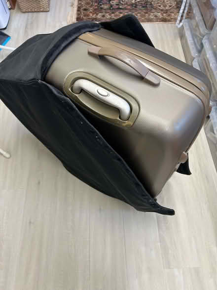 Photo of free Large hard-shell suitcase with zipped waterproof cover (Crossgates LD1) #1