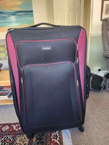 Photo of free Extra large suitcase (East Grinstead RH19) #1