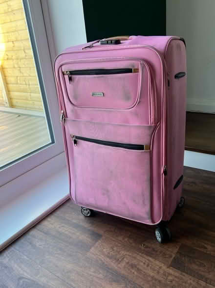 Photo of free Medium pink suitcase (Hollingbury BN1) #2