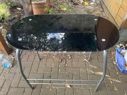 Photo of free Black glass and metal bar table (Mitcham Common CR4 1) #1