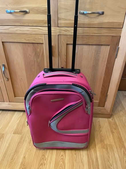 Photo of free Pink small suitcase (Fawdon NE3) #1