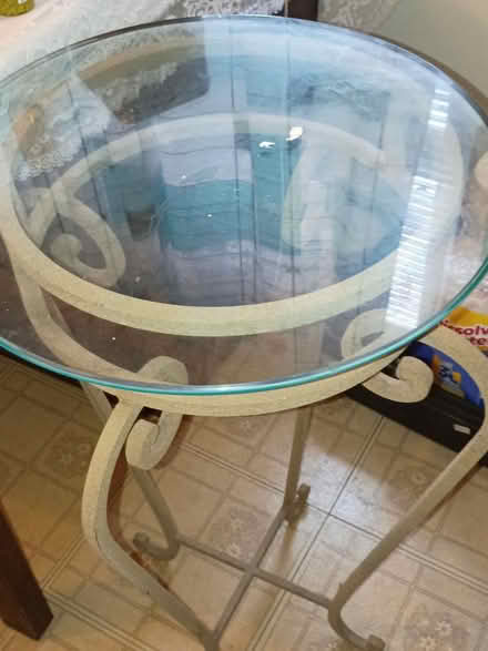 Photo of free Heavy iron glass top table (7531 rising sun avenue) #1