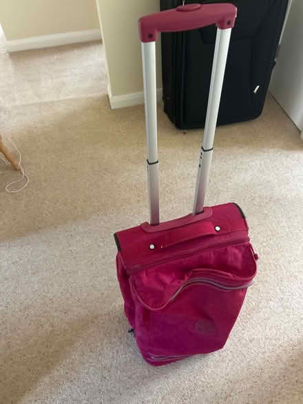 Photo of free Purple wheely cabin luggage (Fleetville AL1) #3