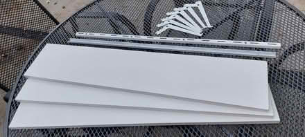 Photo of free White shelving + 2 wall shelving uprights + 6 brackets (Glusburn BD20) #1