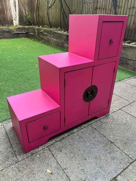 Photo of free Bright pink tiered step cupboard (Dollis Hill NW2) #3