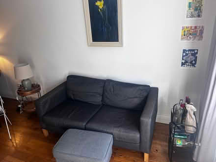 Photo of free Grey Sofa with Matching Footstool (cork street) #1