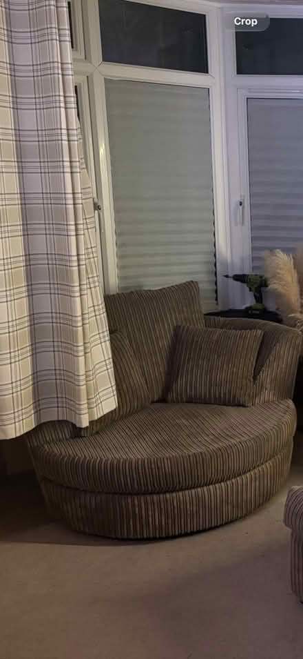 Photo of free Brown swivel/cuddle chair (Swindon SN2) #1