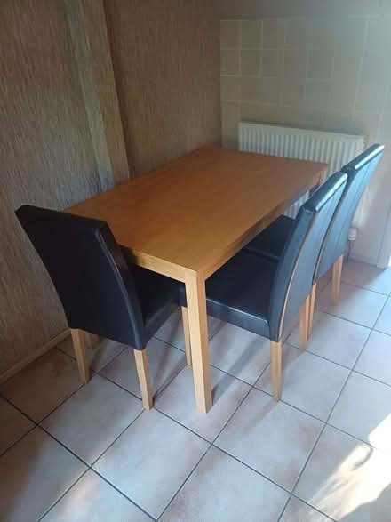 Photo of free Dining table and three chairs, good condition. (Dunfermline KY11) #1