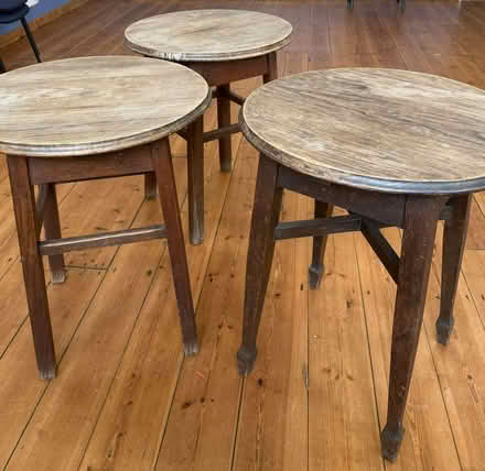 Photo of free Three wooden tables (approx 3ft high / 2ft diameter) (Stoke Holy Cross NR14) #1