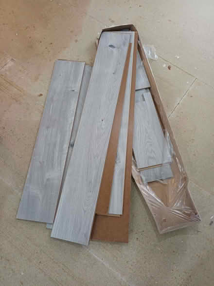 Photo of free A small amount of grey laminate flooring and underlay (Walnut Tree MK7) #1