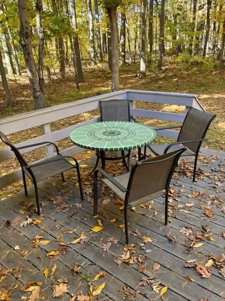 Photo of free Out door glass table and 4 chairs (03079 off Shannon Road, Salem) #1