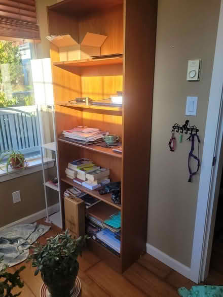 Photo of free Tall wooden bookshelf (Sunriver Estates) #1