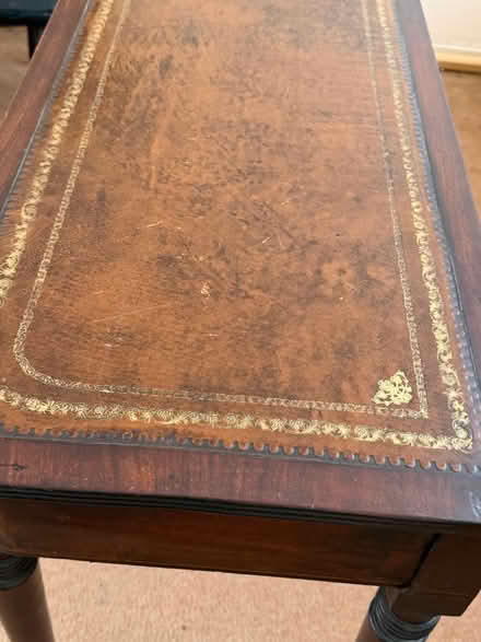 Photo of free Leather top table (Dagenham RM9) #1