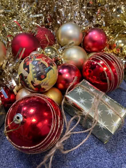 Photo of free Box of gold tinsel plus red & gold Xmas decs (Eastbourne BN21) #1