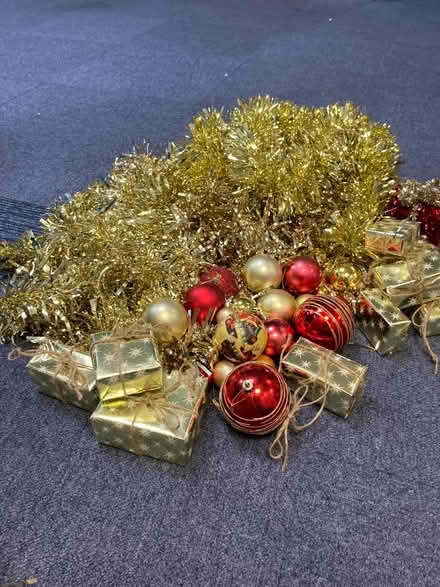 Photo of free Box of gold tinsel plus red & gold Xmas decs (Eastbourne BN21) #2