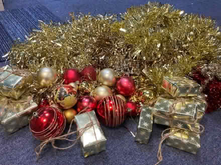 Photo of free Box of gold tinsel plus red & gold Xmas decs (Eastbourne BN21) #4