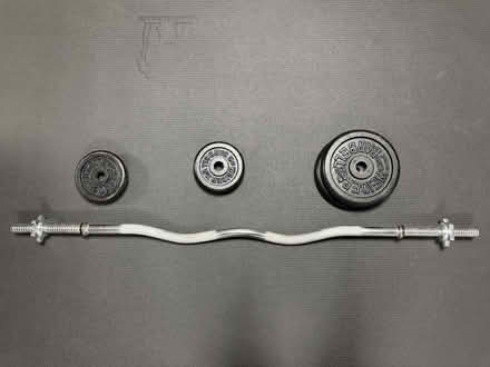 Photo of free Weight Bar and Weights (Tanley Rd & New Hampshire Ave) #1