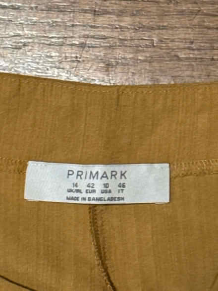 Photo of free Size 10 Mustard Wrap Shorts (Clason Point Bronx NY) #3