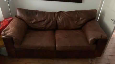Photo of free Brown two-seater sofa bed in used condition. (Englefield Green TW20) #1
