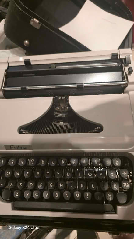 Photo of free Christas tree stand, tilting TV wall mount, Erika typewriter (Tulse Hill SW2) #3