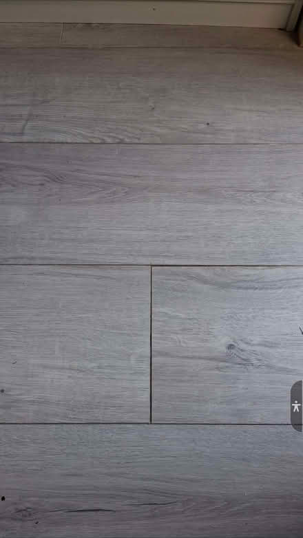 Photo of 1 or more lengths of pale grey laminate flooring (Battle RG30) #1