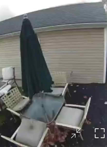 Photo of free Patio set w/ cusions and umbrella (Off Walton near Joslyn) #1