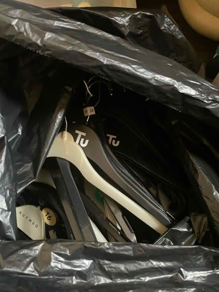 Photo of free Bag of black plastic coathangers (SE13 Hither Green) #1