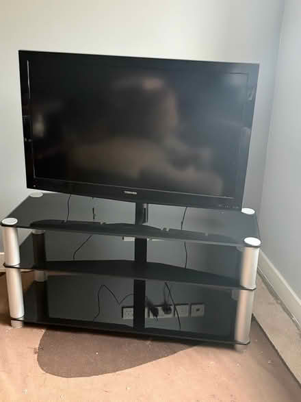 Photo of free TOSHIBA 35inch tv and glass stand (Great Bardfield CM7) #1