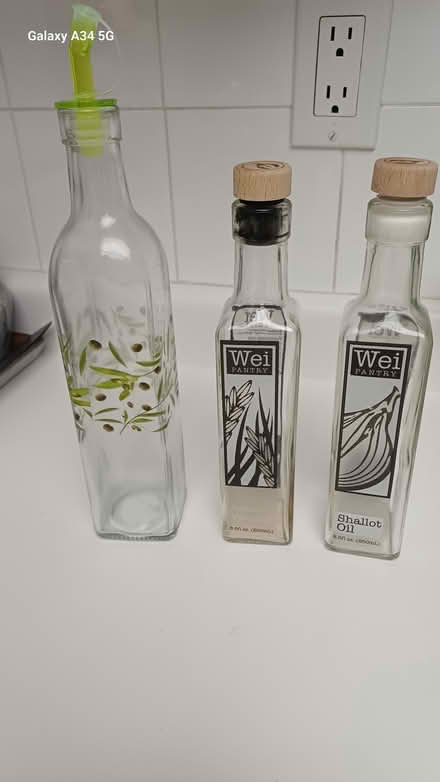 Photo of free Olive bottles (18 Concorde Place) #1