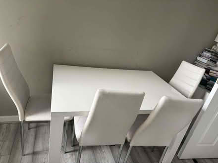 Photo of free White gloss dining table with 4 chairs Dimensions 120cm x 8 (Plaistow E13) #1