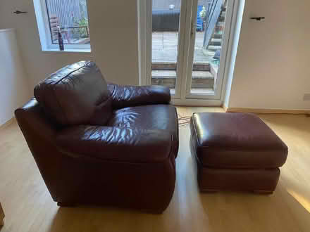 Photo of free Red single leather sofa with foot stool. Very comfortable. (Woking GU21) #2