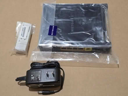 Photo of free new Netgear wifi router/ wifi card (9th line&hoover park dr.) #1