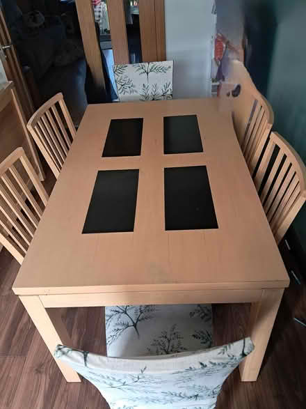 Photo of free Dining table and chairs (Swords) #1