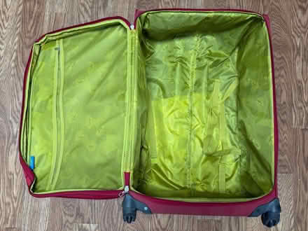 Photo of free Large rolling suitcase (Valencia Avenue, Sunnyvale) #4