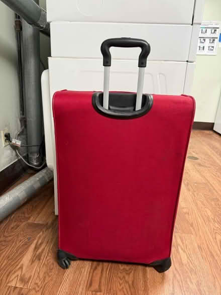 Photo of free Large rolling suitcase (Valencia Avenue, Sunnyvale) #2