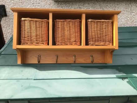Photo of free Small storage boxes in wall unit with 4 coat hangers beneath (Morland CA10) #1