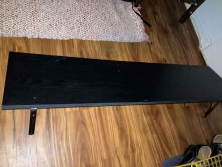Photo of free Rubbermaid Black Shelf With Bracket (Takoma, DC) #1