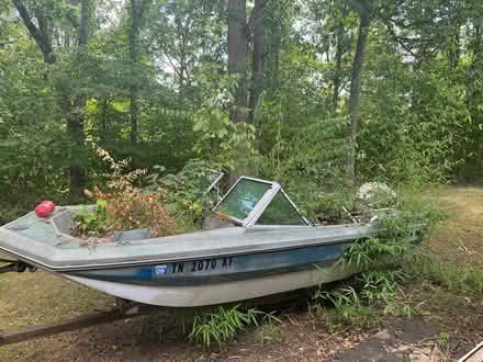 Photo of free Boat and trailer (back yard. Bad tires. Sunk) #1
