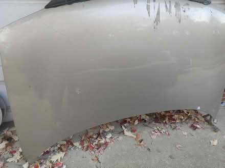 Photo of free Pontiac Montana Hood. Decent shape (Warren) #1