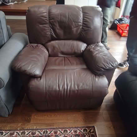 Photo of free Comfortable brown leather recliner armchair good condition (Stroud Green N4) #1