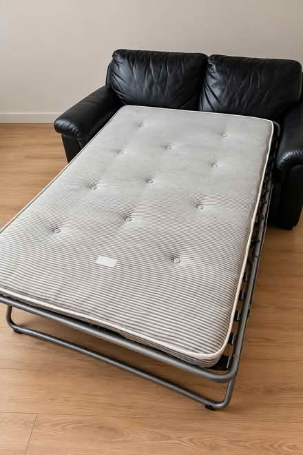 Photo of free Black leather sofa bed (Bromborough CH62) #1