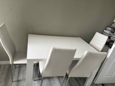 Photo of free White gloss dining table and 4 chairs (Elmwood Court E10) #1