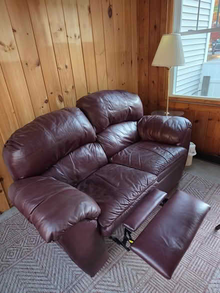 Photo of free Leather love seat recliner (401 longley rd groton MA) #1