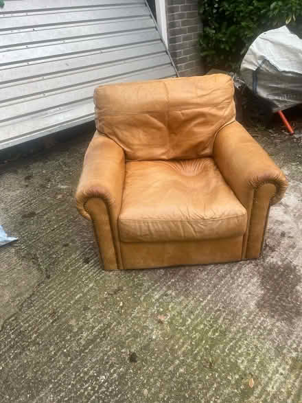 Photo of free Two identical distressed leather armchairs (Great Barrow CH3) #1